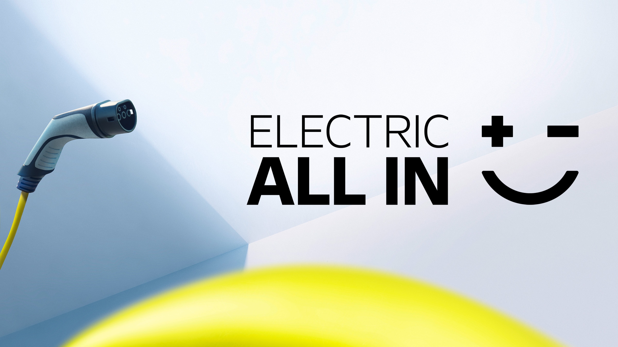 Elektroauto-Ladegerät mit Markenbotschaft „Electric All In“ und Smiley-Symbol.